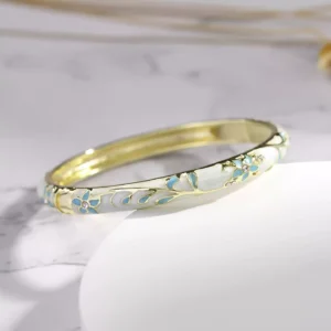 Beijing Cloisonné Bangle: Handcrafted enamel bracelet with imperial dragon motifs—a vibrant, cultural souvenir from China’s artistic capital!